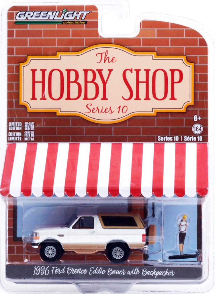 Greenlight - 1:64 The Hobby Shop Series 10 1996 Ford Bronco Eddie Bauer w/ Backpacker - Image 2