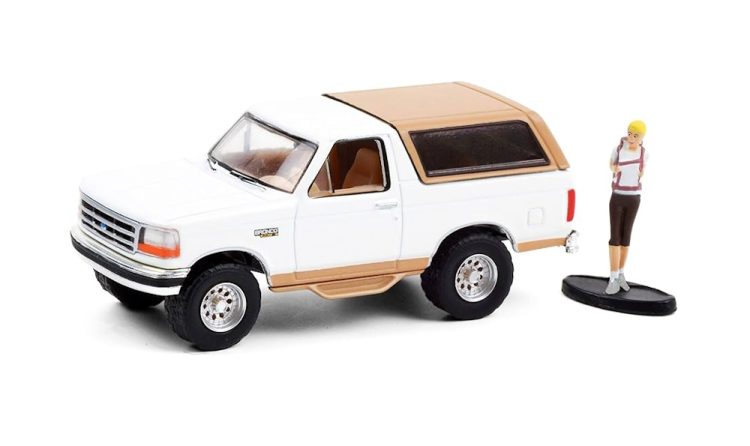 Greenlight - 1:64 The Hobby Shop Series 10 1996 Ford Bronco Eddie Bauer w/ Backpacker