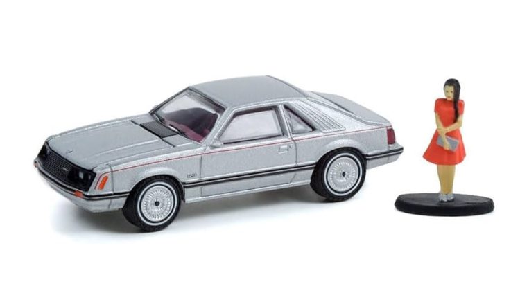 Greenlight - 1:64 The Hobby Shop Series 12 1979 Ford Mustang Coupe Ghia w/ Woman in a Dress